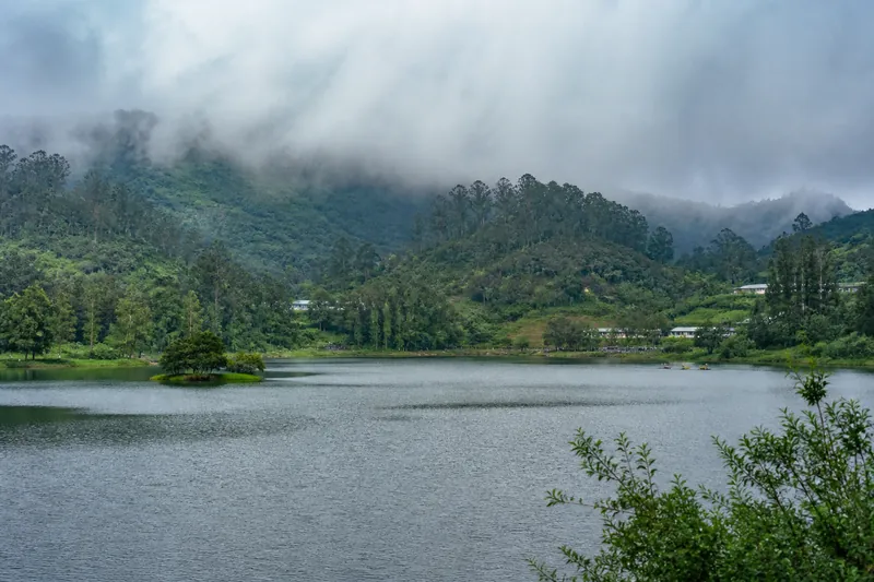 Misty lake and hills at Kodaikanal